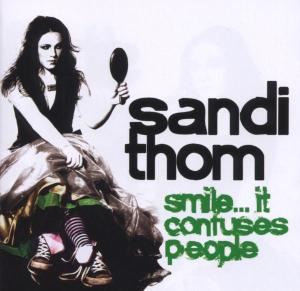 CD Shop - THOM, SANDI SMILE..IT CONFUSES PEOPLE