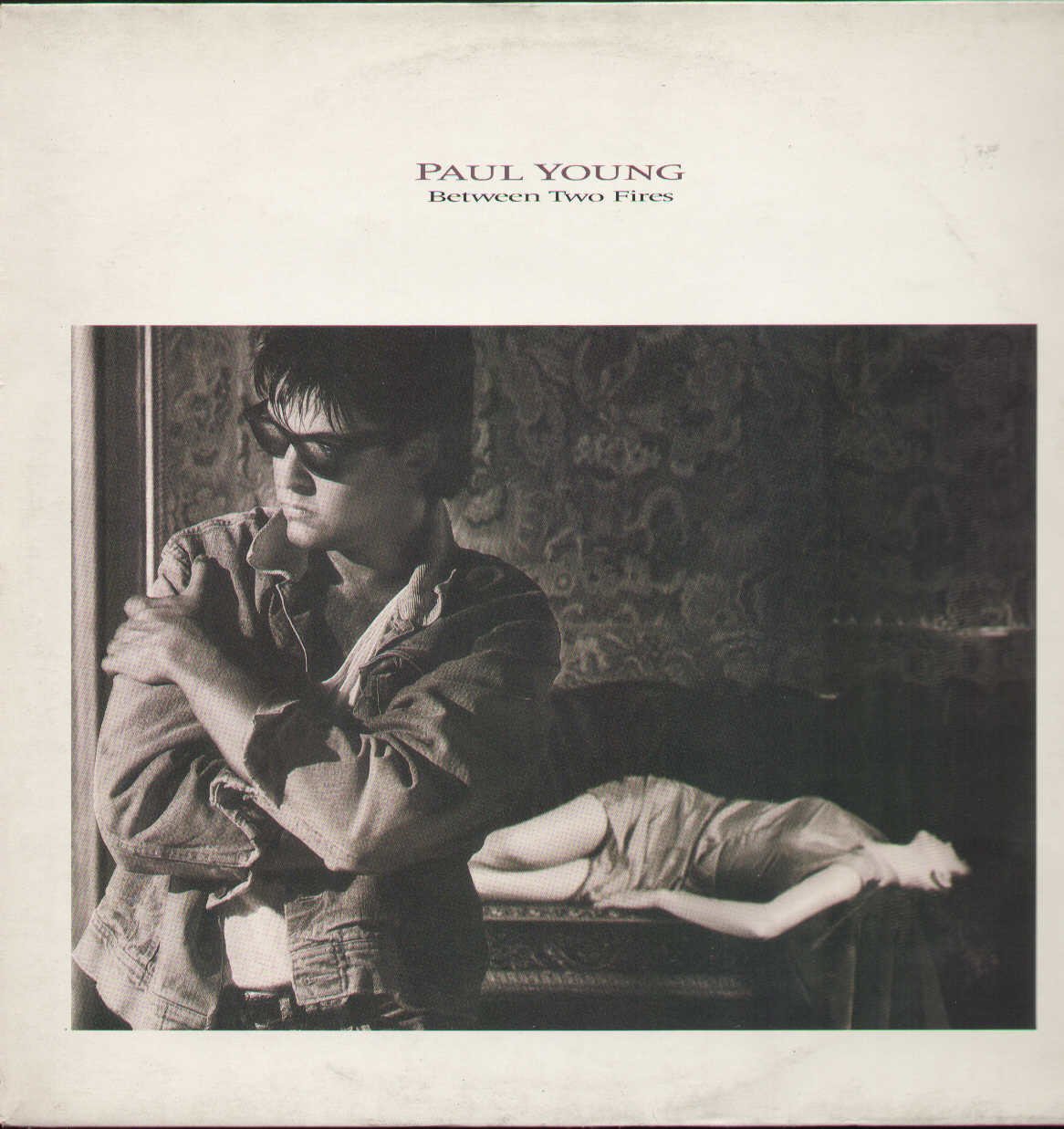 CD Shop - YOUNG, PAUL BETWEEN TWO FIRES